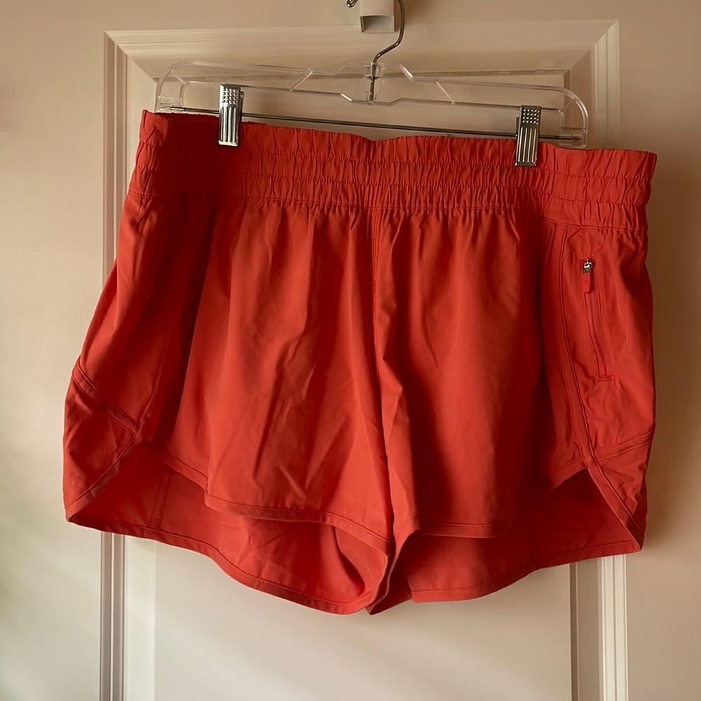 lululemon tracker low rise 4” short coral